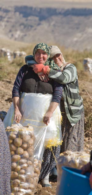 Potato Picker Hug, Nevsehir, Cappadocia, Turkey, Oct 2007